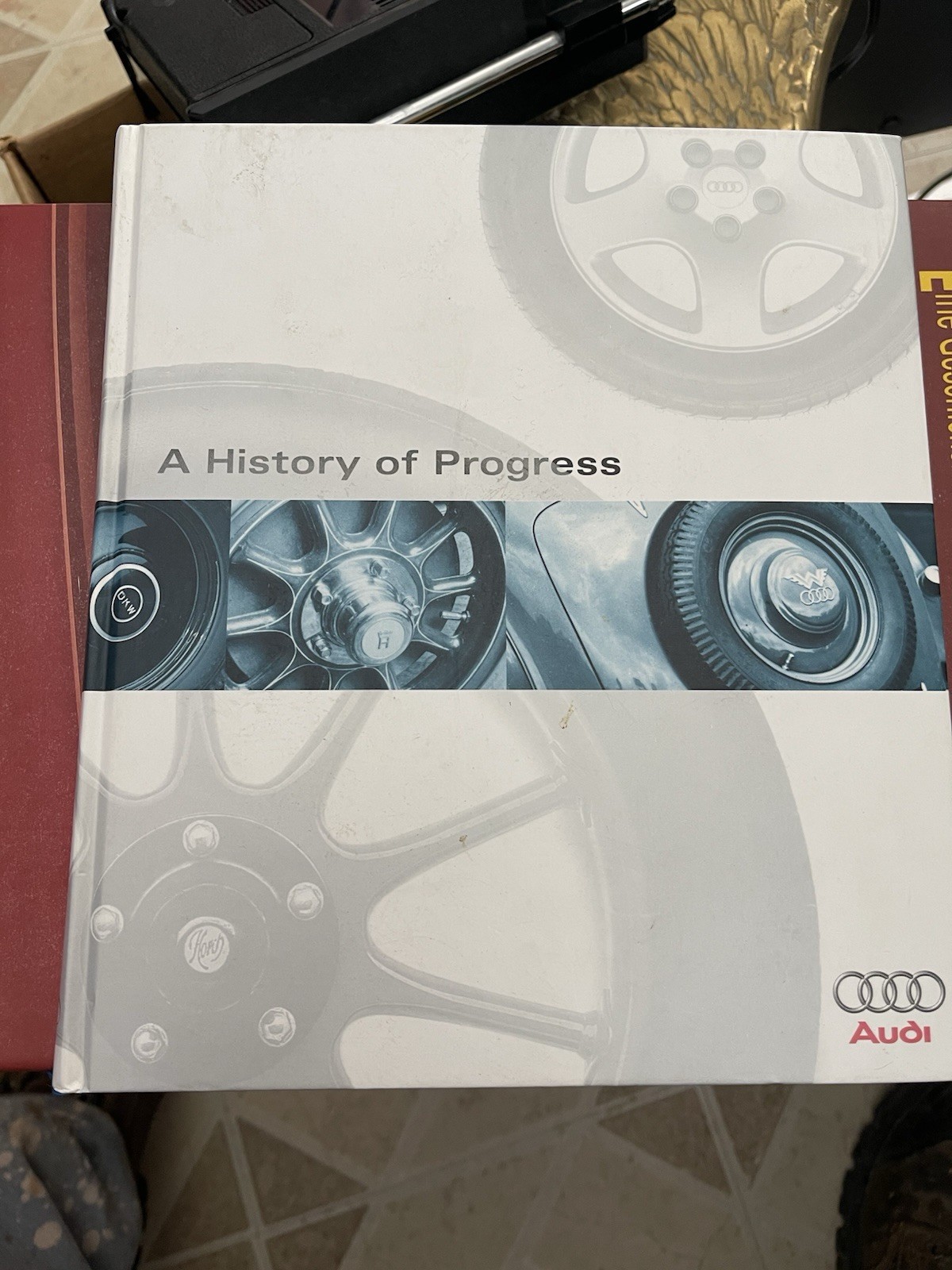 A HISTORY OF PROGRESS—CHRONICLE OF AUDI AG (1996) HARDCOVER—276 PAGES Good Book.