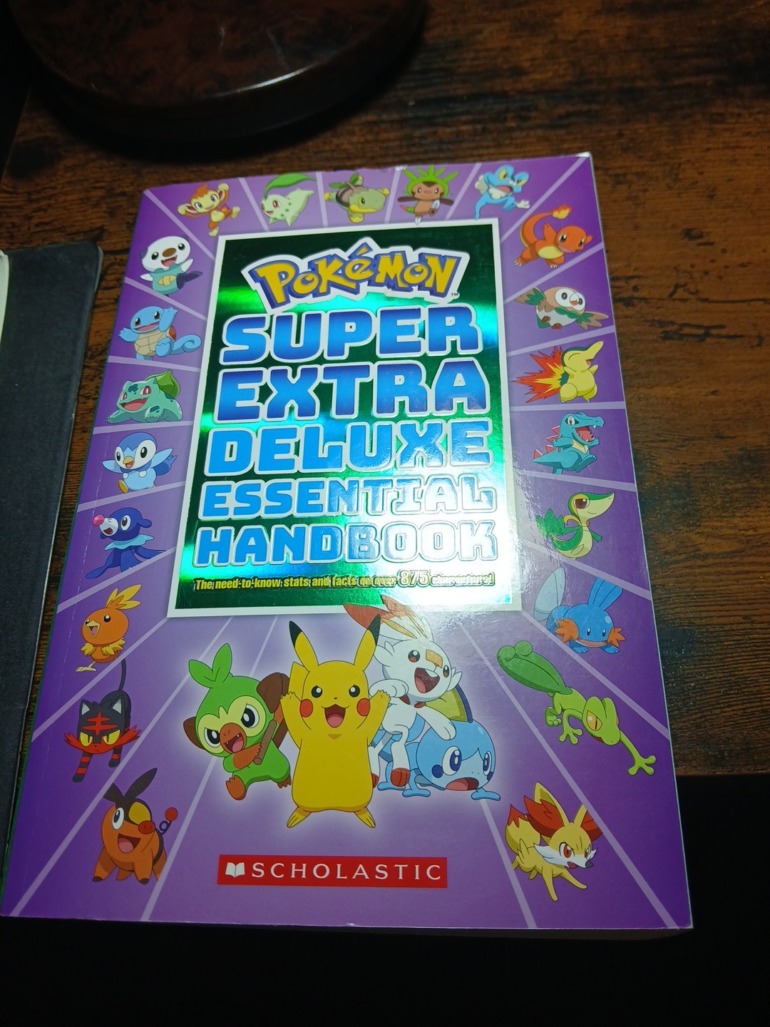 Super Extra Deluxe Essential Handbook: the Need-To-Know Stats and Facts on over