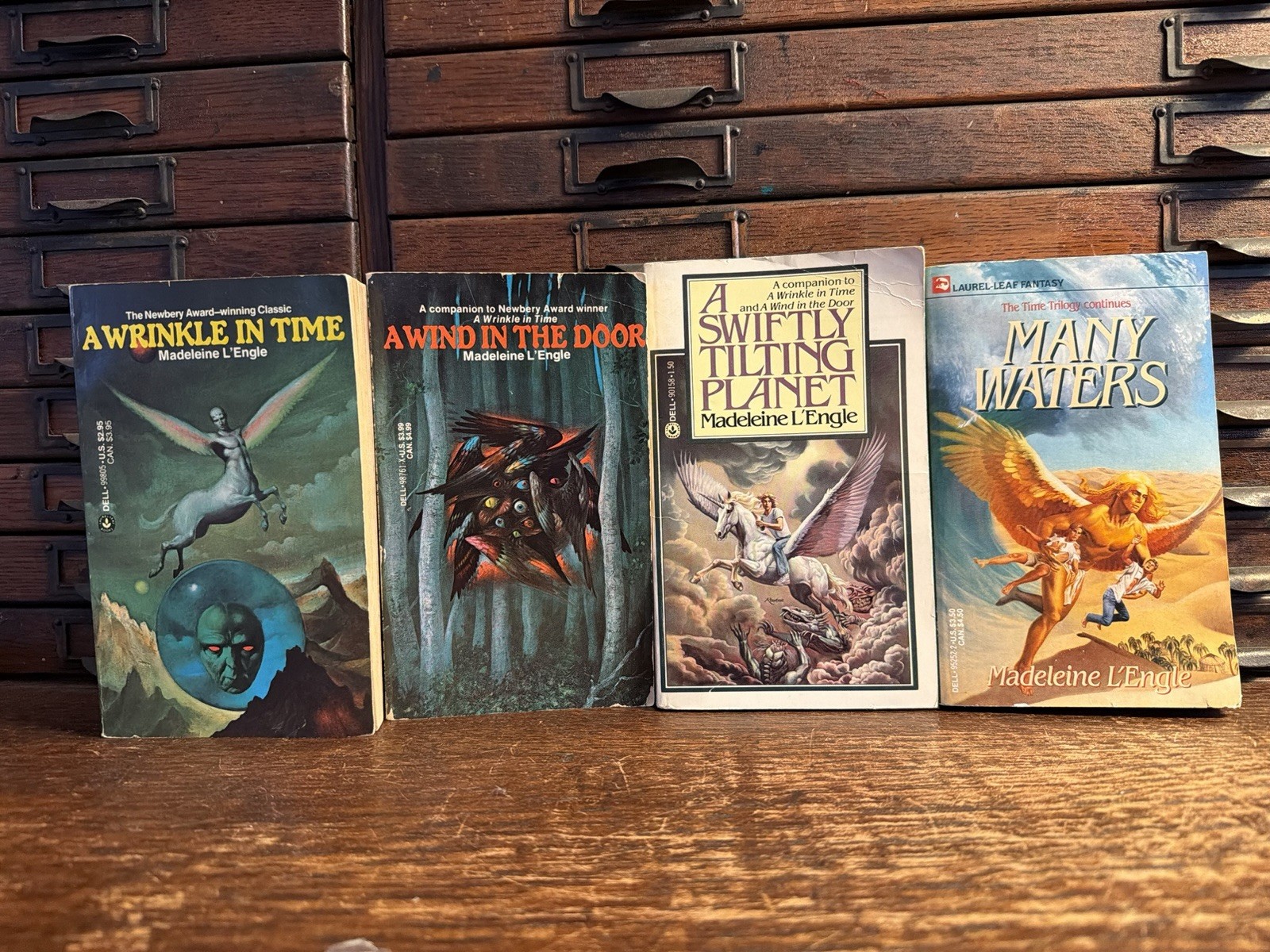 Lot 4: Wrinkle in Time Madeleine L&rsquo;Engle 1976 Stranger Things Paperback Set Wind