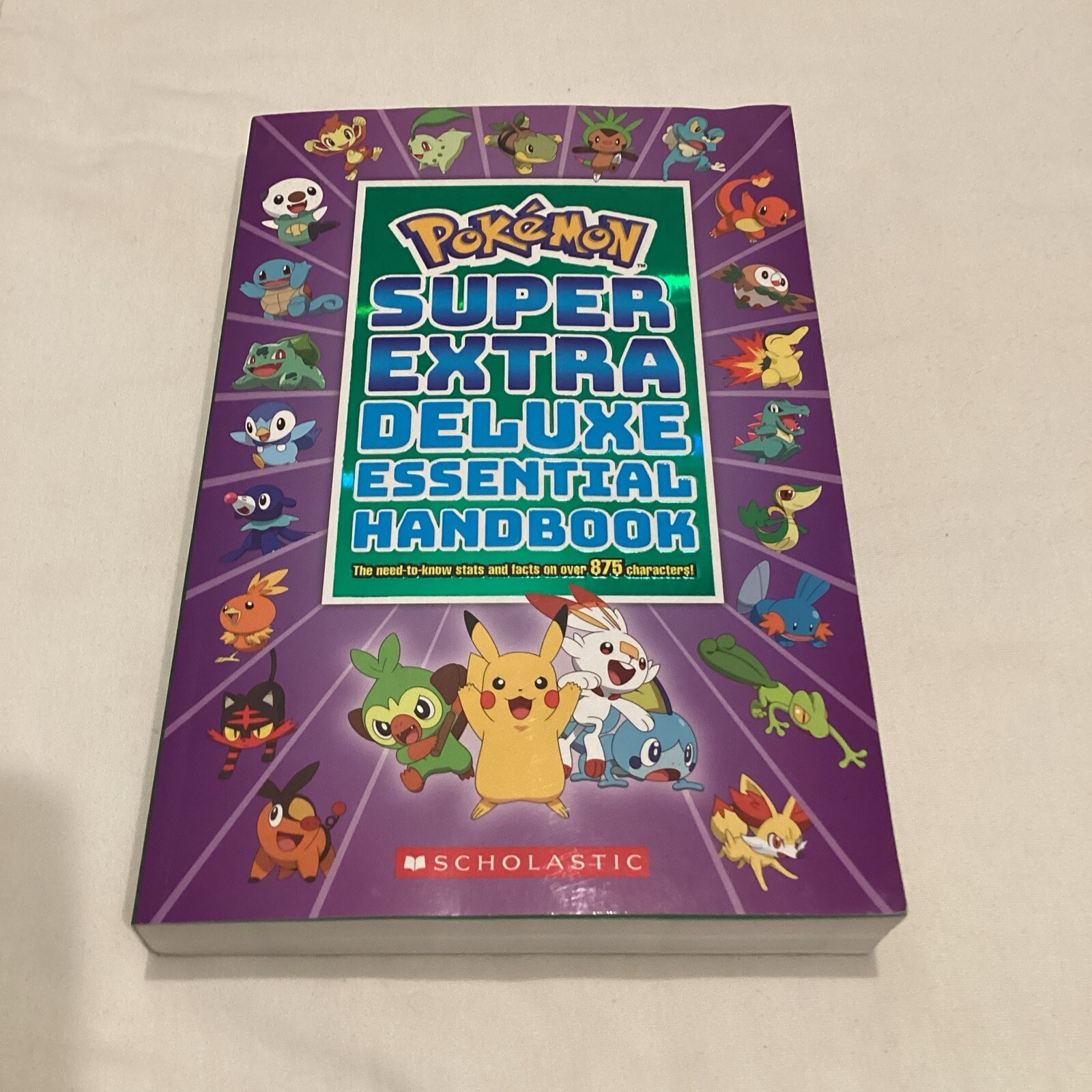 POKÉMON Super Extra Deluxe Essential Handbook 2021 Paperback PREOWNED